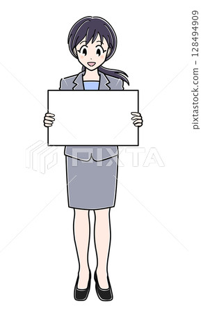 An office lady in a suit standing with a flip board An office lady in a suit standing with a flip board 128494909