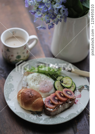 A simple breakfast of eggs and bread 128495010