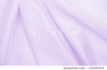 Smooth elegant lilac silk or satin texture as wedding background. Luxurious background design Smooth elegant lilac silk or satin texture as wedding background. Luxurious background design 128495055