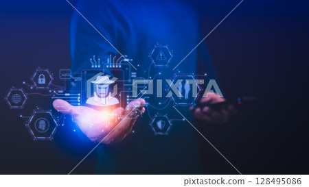 Person holding a smartphone with a glowing detective icon and cybersecurity symbols, Concept of online privacy, security cyber threats, data breaches, hacking and technology digital security risks. 128495086