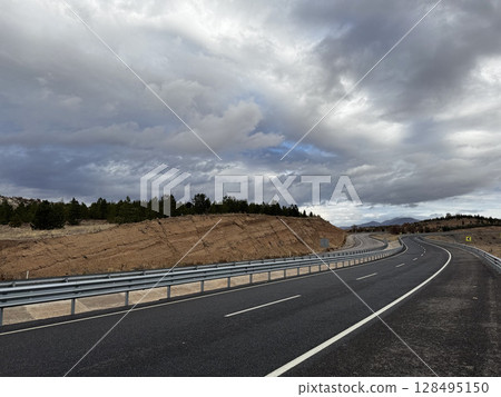 Cloudy road landscape. High quality photo 128495150