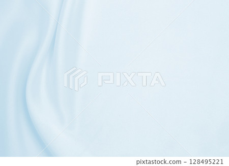 Smooth elegant blue silk or satin luxury cloth texture as abstract background. Luxurious background design Smooth elegant blue silk or satin luxury cloth texture as abstract background. Luxurious background design 128495221