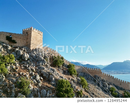 fortress on a rock near the sea coast fortress on a rock near the sea coast 128495244