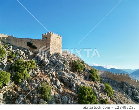 fortress on a rock near the sea coast 128495253