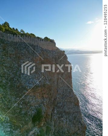 fortress on a rock near the sea coast 128495255
