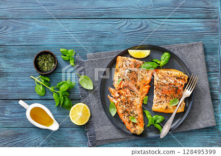 grilled salmon fillets with skin-on, top view grilled salmon fillets with skin-on, top view 128495399