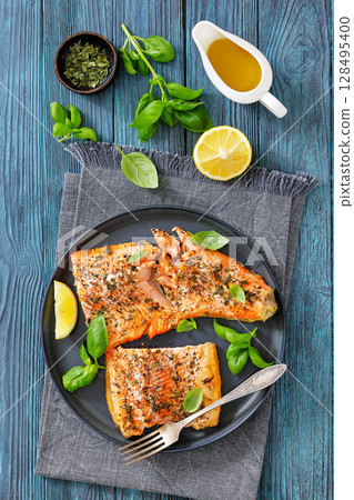grilled salmon fillets with skin-on, top view grilled salmon fillets with skin-on, top view 128495400