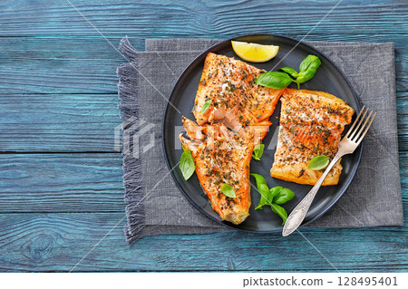 grilled salmon fillets with skin-on, top view grilled salmon fillets with skin-on, top view 128495401
