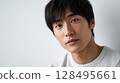 A thoughtful young man with a calm aura | Natural light 128495661