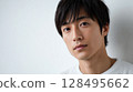 A thoughtful young man with a calm aura | Natural light 128495662