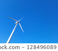 Wind power generator shining in the blue sky 128496089