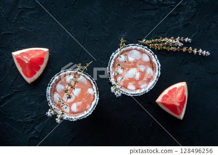 Salty Dog cocktail with fresh grapefruit juice, lime juice, and thyme 128496256