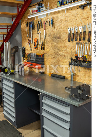 Mechanic workshop contains professional tools for bicycle repair 128496412