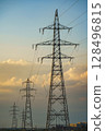 Power lines dyed in the sunset 128496815