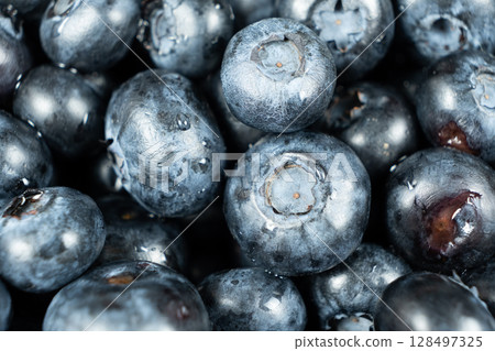 Macro Shot of Juicy Blueberries Covered in Water Drops. Macro Shot of Juicy Blueberries Covered in Water Drops. 128497325