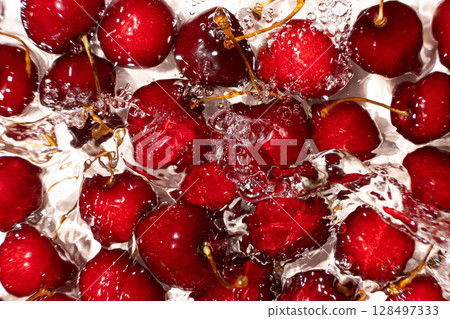 Red Sweet Cherries with Water Splash from Above. Red Sweet Cherries with Water Splash from Above. 128497333