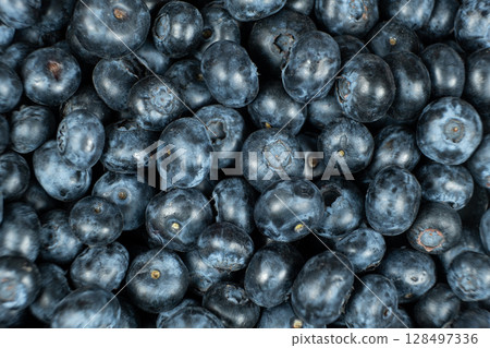 Macro View of Organic Blueberries. Natural Berry Background. Macro View of Organic Blueberries. Natural Berry Background. 128497336