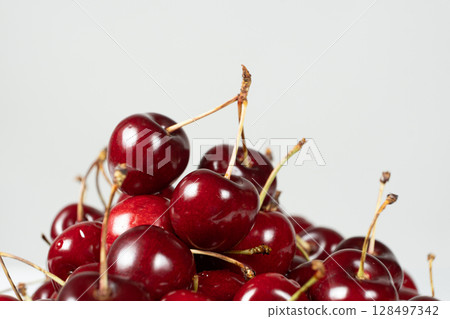 Close-up of fresh red sweet cherry Close-up of fresh red sweet cherry 128497342