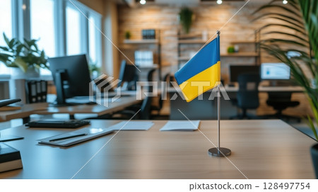 Minimalist modern office with Ukrainian flag on desk highlighting professionalism and focus 128497754