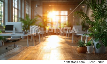 Open office space with modern desks and natural light creating a productive atmosphere 128497804