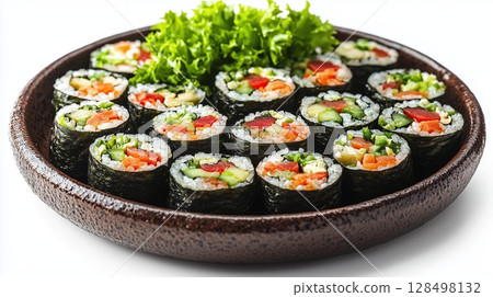 Freshly made sushi rolls beautifully arranged on a brown plate with lettuce garnish against a white background 128498132