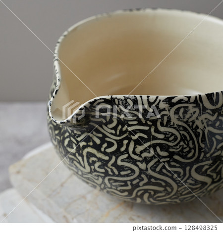 Tea bowl ceramic on gray background. 128498325