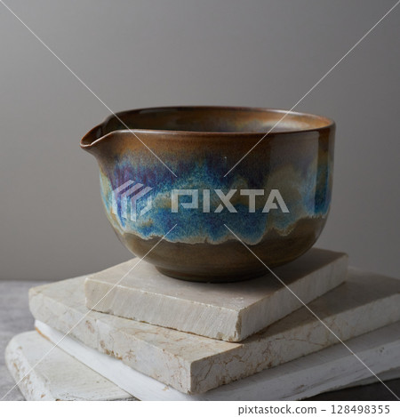 Tea bowl ceramic on gray background. Tea bowl ceramic on gray background. 128498355