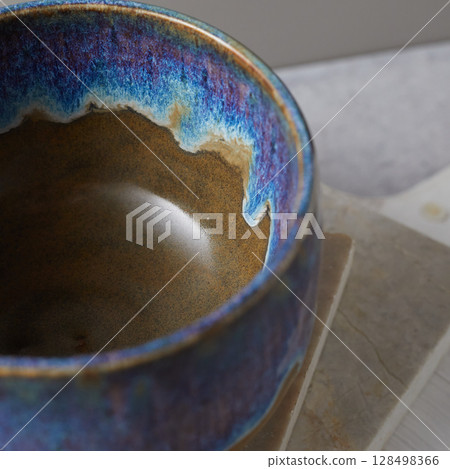 Tea bowl ceramic on gray background. Tea bowl ceramic on gray background. 128498366