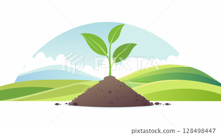 Small plant thriving in rich earth surrounded by natural hills and open blue sky. 128498447