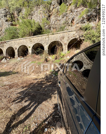 ancient water supply arches architecture mountains autumn. High quality photo ancient water supply arches architecture mountains autumn. High quality photo 128499117