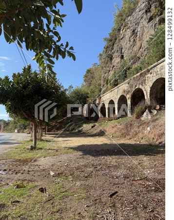 ancient water supply arches architecture mountains autumn. High quality photo ancient water supply arches architecture mountains autumn. High quality photo 128499132