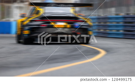Motion blur race car racing on speed track, Motion blurred super car race on street track circuit, Automobile automotive transportation vehicle background, Motion blur race car racing on speed track, Motion blurred super car race on street track circuit, Automobile automotive transportation vehicle background, 128499175