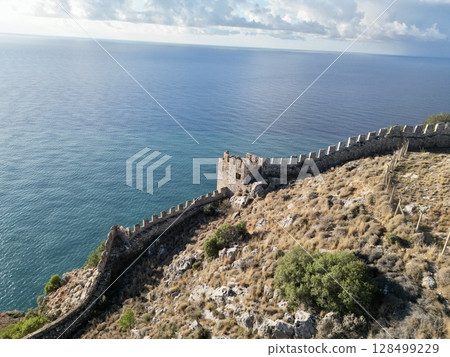 fortress on a rock near the sea coast fortress on a rock near the sea coast 128499229