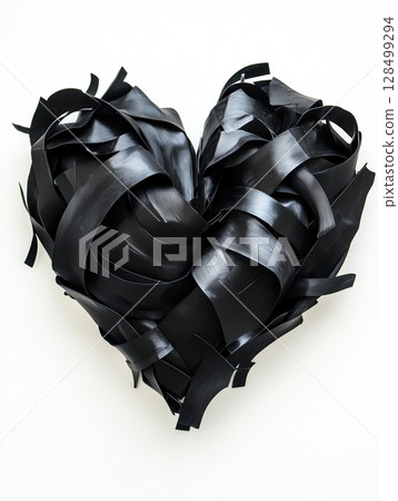 Abstract black heart with irregular edges on a white background symbolizes love and emotion Abstract black heart with irregular edges on a white background symbolizes love and emotion 128499294