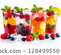 Visual presentation of cold berry soda drink with colorful fruits and mint 128499550