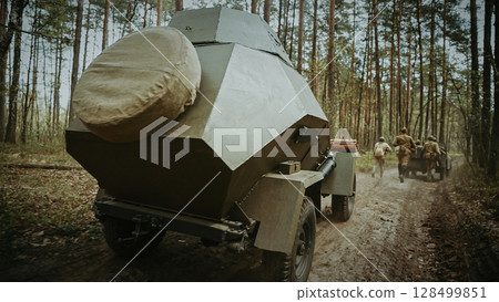 Military Armored Vehicle in Forest Landscape Dynamics Scene 128499851