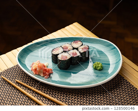 Delicious tuna hosomaki rolls Delicious tuna hosomaki rolls 128500146