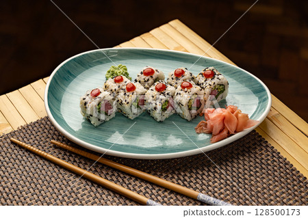 Uramaki sushi rolls with tuna Uramaki sushi rolls with tuna 128500173