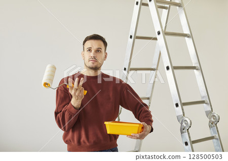 Unprofessional painter thinking about repair problems, construction worker unable painting walls 128500503