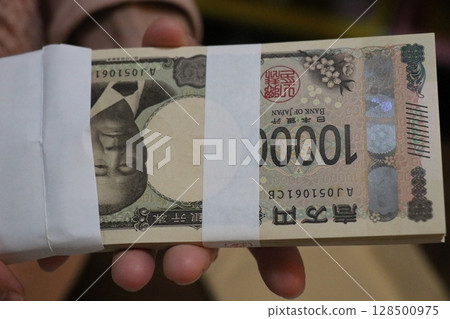 Money, stack of bills, million yen 128500975
