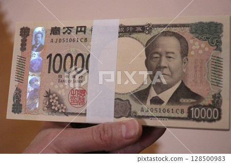 Money, stack of bills, million yen 128500983