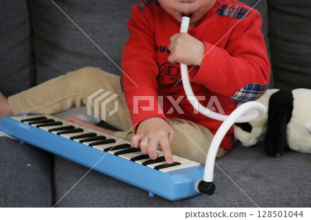Pianica practice scene, toddler Pianica practice scene, toddler 128501044