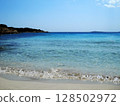Beautiful Sea View in Olbia, Sardinia. Breathtaking sea view from the coastal city of Olbia in northeastern Sardinia, Italy. The image features crystal-clear turquoise waters, rugged Mediterranean 128502972