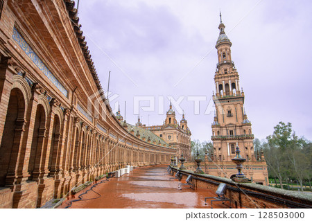 Sevilla Plaza de Espana Fountain in Spring Rainy Dusk. Sevilla Plaza de Espana Fountain in Spring Rainy Dusk. 128503000