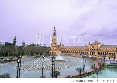 Sevilla Plaza de Espana with Fountain and Tower at Dusk. Sevilla Plaza de Espana with Fountain and Tower at Dusk. 128503001