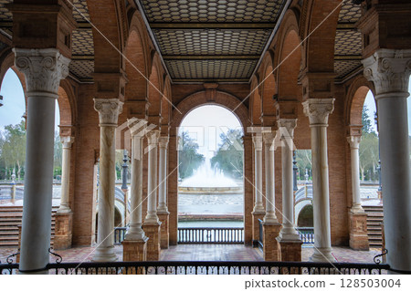 Plaza de Espana Seville Spain Arched Gallery View of Fountain. 128503004