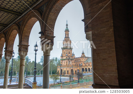 Sevilla Plaza de Espana Twilight Rain with Ornate Arcade. Sevilla Plaza de Espana Twilight Rain with Ornate Arcade. 128503005