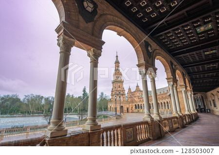 Sevilla Plaza de Espana Twilight Rain with Ornate Arcade. 128503007