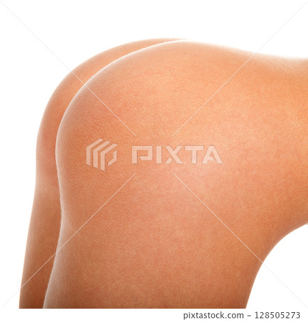Beautiful female buttocks isolated on white background 128505273