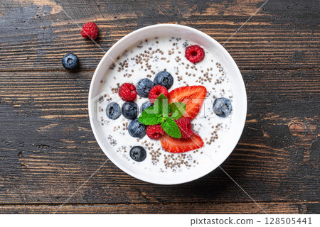 Overnight chia bowl with yogurt and fresh berries Overnight chia bowl with yogurt and fresh berries 128505441